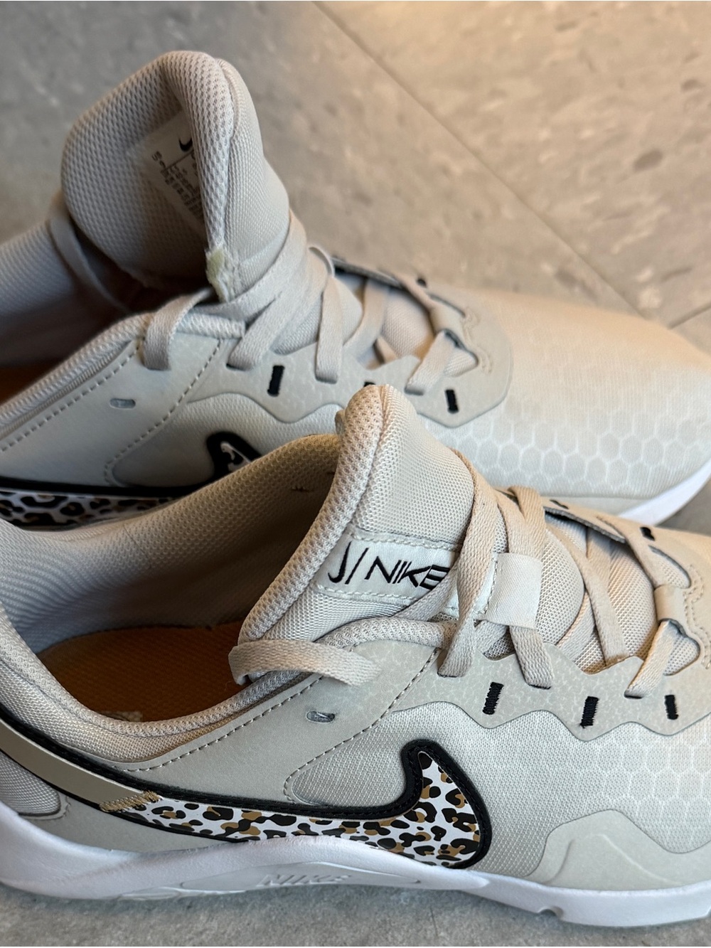 Nike Women’s Beige Sneakers with Leopard Swoosh
